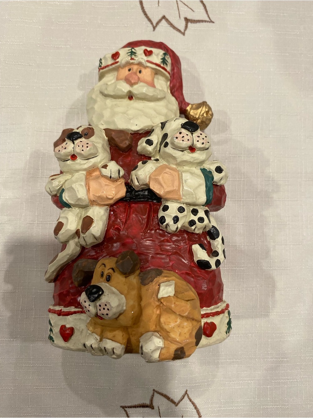 Holiday Time Santa Figurine with Playful Dogs in Red and Cream
